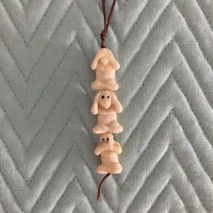 Scrimshaw monkey charm